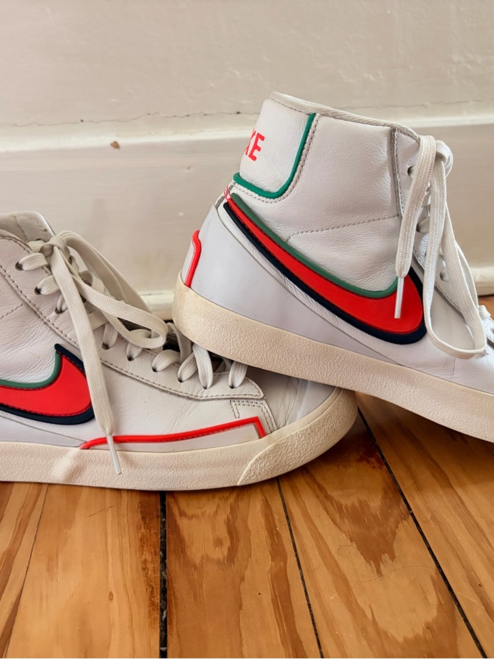 Nike White High-Top Sneakers with Red, Green & Navy Swoosh